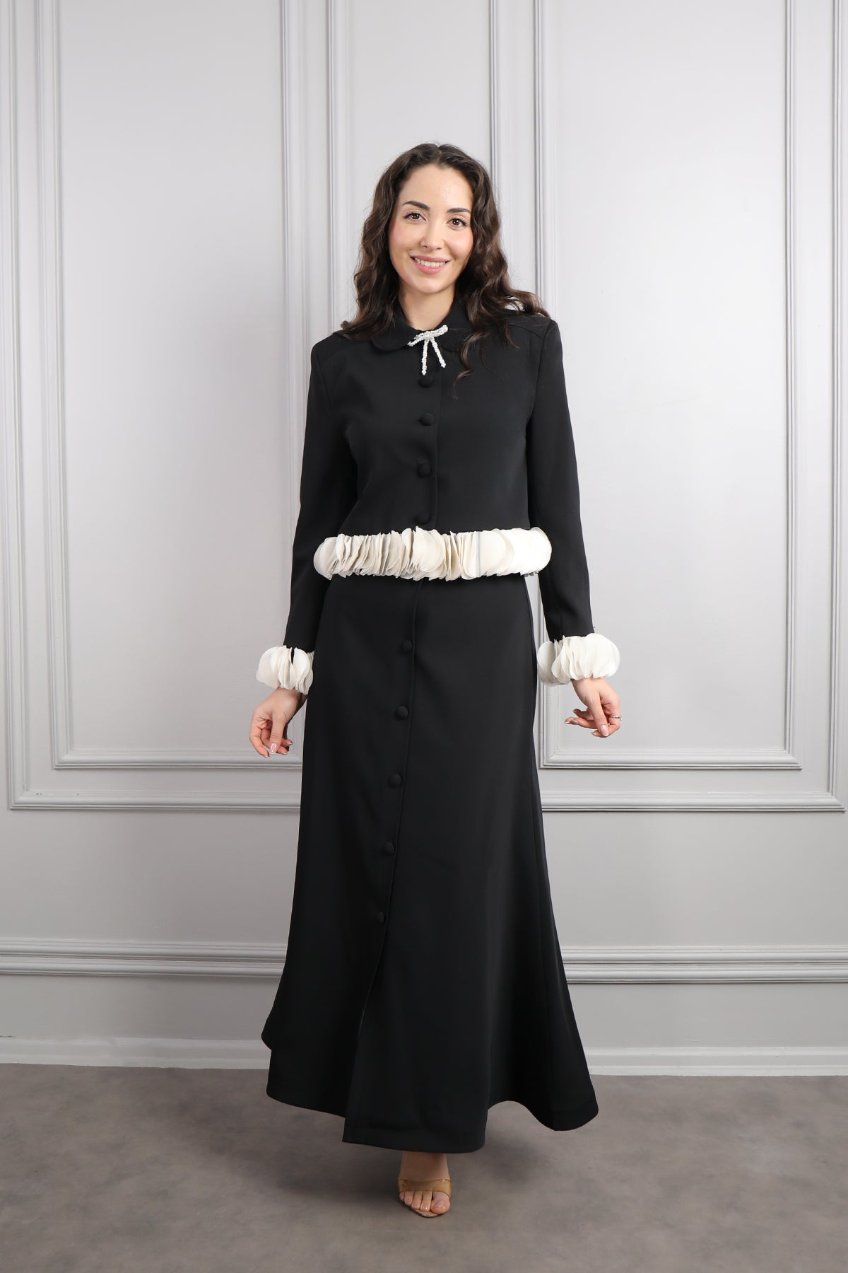 طقم تنورة وجاكيت بتفاصيل كشكشة وزينة فيونكة -اسود