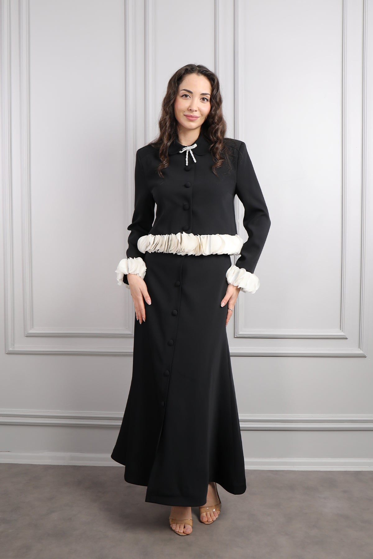 طقم تنورة وجاكيت بتفاصيل كشكشة وزينة فيونكة -اسود