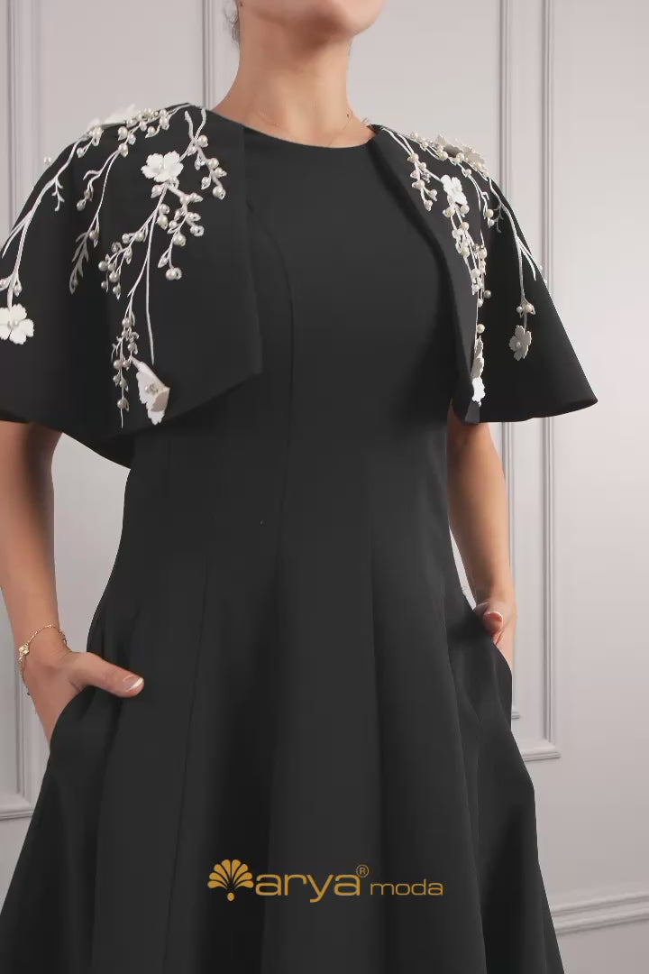 فستان سهرة ميدي مع تصميم بوليرو وتفاصيل زهور وجيوب - اسود