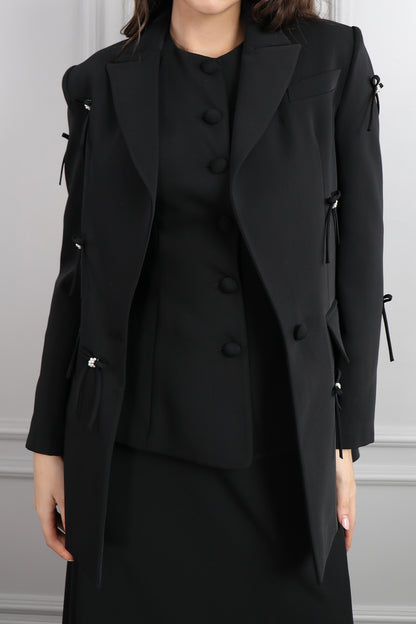 طقم تنورة وتوب وجاكيت بزينة فيونكات -اسود