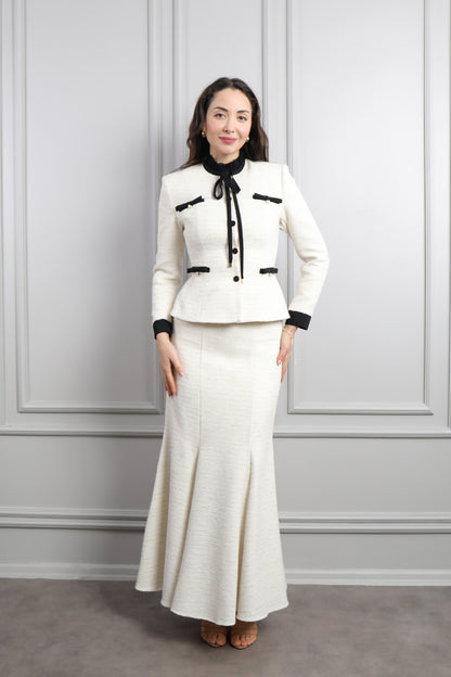 طقم تنورة وتوب رسمي بزينة فيونكات وتفصيل كشكشة عالياقة -سكري