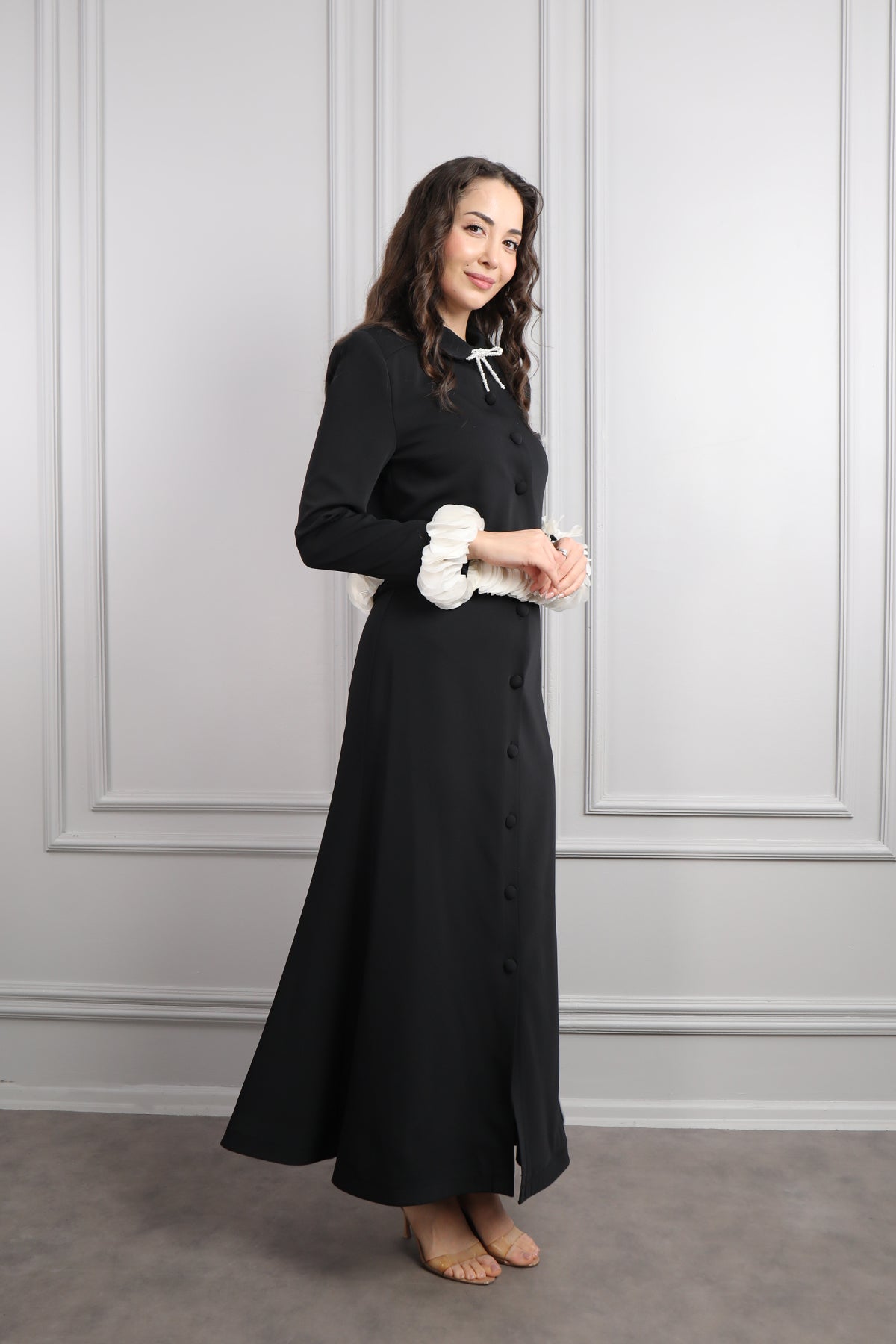 طقم تنورة وجاكيت بتفاصيل كشكشة وزينة فيونكة -اسود