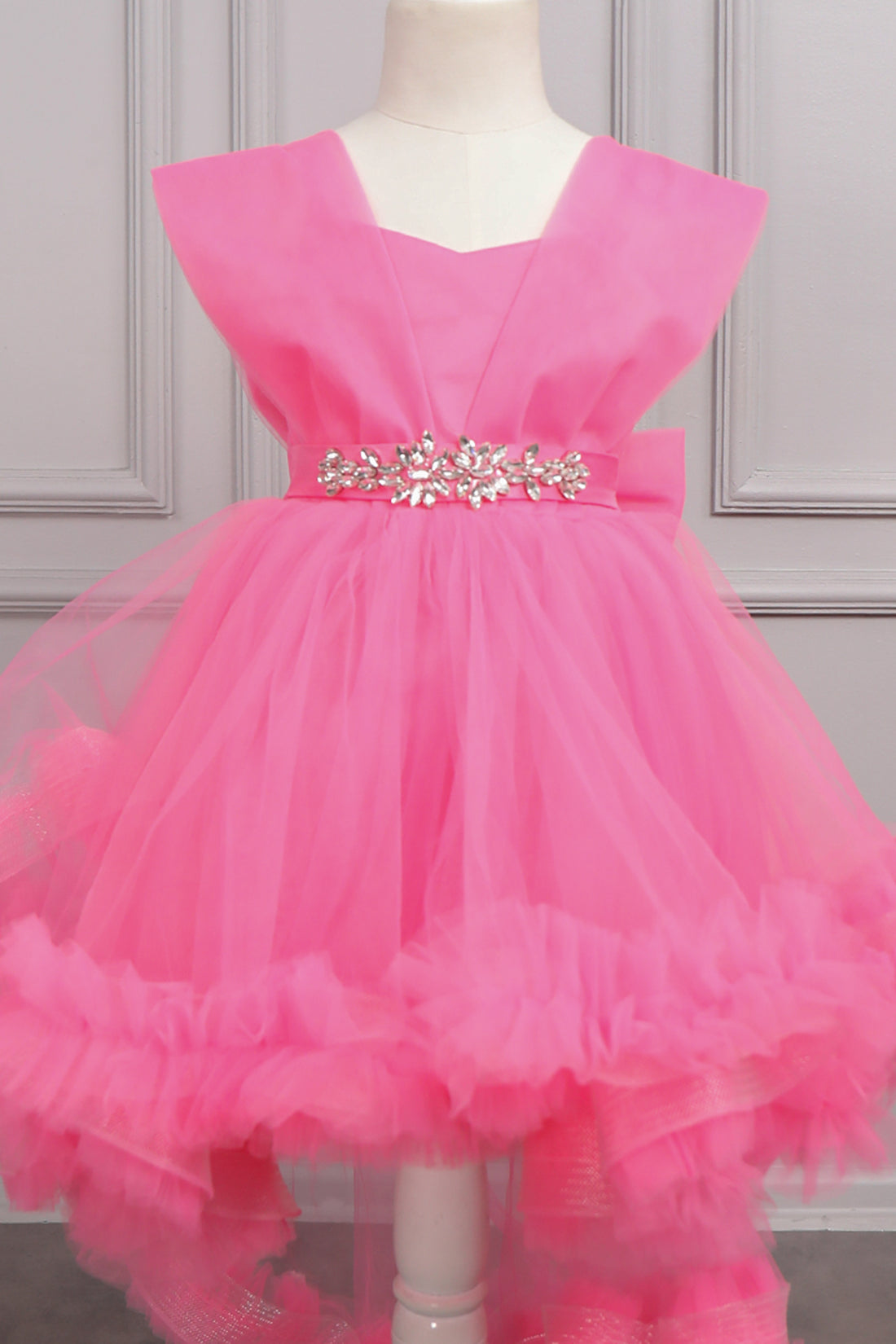 فستان اطفال بذيل وكشكشة وحزام كريستالي -وردي