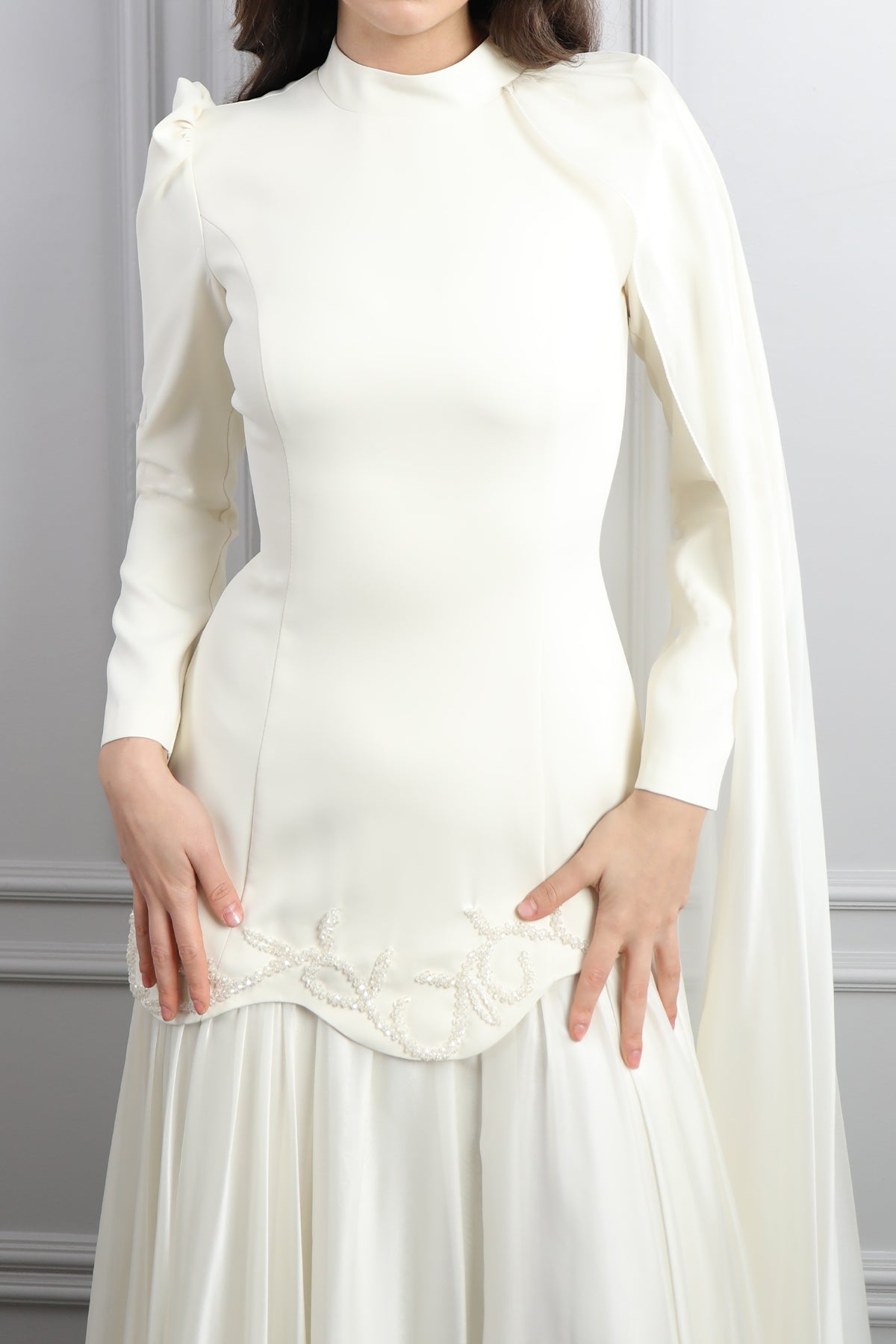 فستان للمحجبات بتطريزات خرزية وتصميم كايب من الكتف -سكري