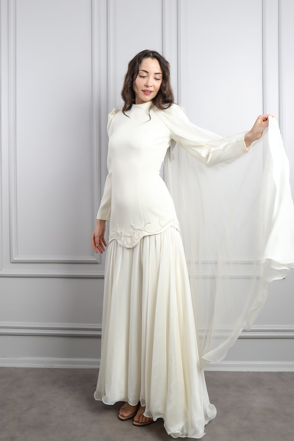 فستان للمحجبات بتطريزات خرزية وتصميم كايب من الكتف -سكري