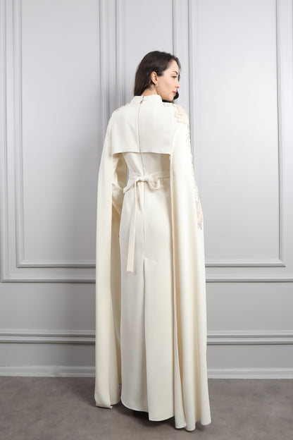 فستان سهرة للمحجبات بتصميم كايب وتطريزات زهورة -بيج