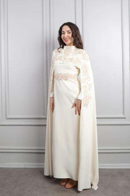 فستان سهرة للمحجبات بتصميم كايب وتطريزات زهورة -بيج